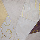 唐草切嵌文様綴袋帯 前柄