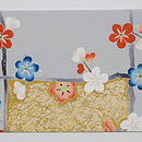 熊谷好博子作 梅枝文様縮緬名古屋帯　前柄