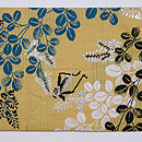 辛子色萩に鈴虫の夏名古屋帯　前柄