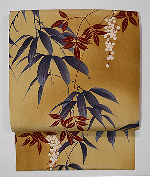 辛子色笹に南天の錦紗名古屋帯