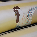 オモチャ柄ニワトリ張り子車の名古屋帯　質感・風合