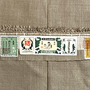 本場結城紬白鼠色袷　証紙