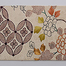 白地江戸裂の名古屋帯 前柄