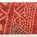 インドバンダニ絞りの名古屋帯　前柄