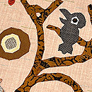 枯れ木にカラスコラージュの名古屋帯　質感・風合